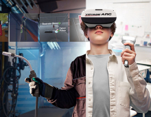 Welding education innovation with virtual reality Student using VR welding headset in classroom training environment